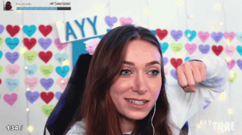 A Girl Holding A Sign That Says Ayy GIF