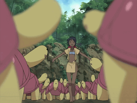 A Girl In A Bikini Is Surrounded By A Bunch Of Turtles GIF