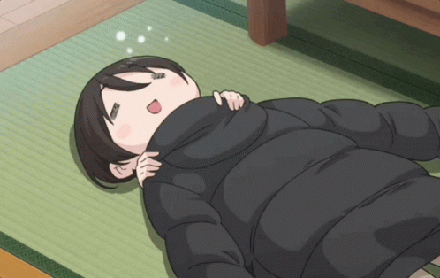 A Girl In A Black Jacket Is Laying On The Floor With Her Mouth Open GIF