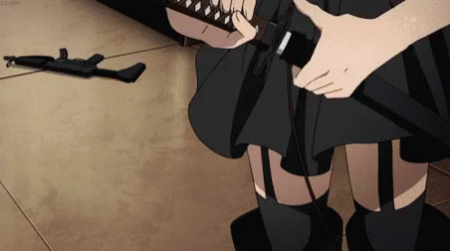 A Girl In A Black Skirt Is Holding A Sword With A Gun Laying On The Floor Behind Her GIF
