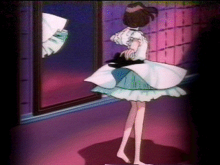A Girl In A Blue And White Dress Stands In Front Of A Mirror GIF