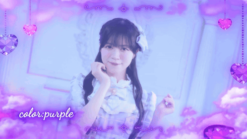 A Girl In A Blue Dress Stands In Front Of A Purple Background With The Words Color Purple Written On It GIF