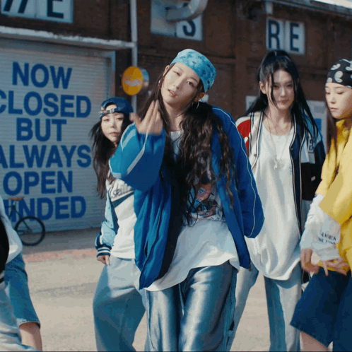 Girl In Blue Jacket In Front Of Closed Sign GIF