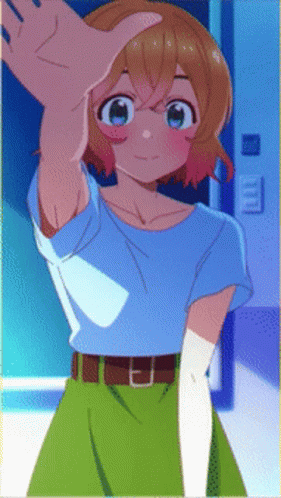 A Girl In A Blue Shirt And Green Skirt Is Standing In Front Of A Door GIF