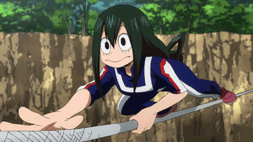 A Girl In A Blue Shirt With The Letter U On It Is Reaching For Something GIF