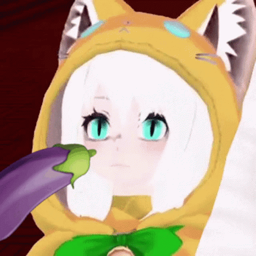 A Girl In A Cat Costume Has A Purple Eggplant On Her Nose GIF