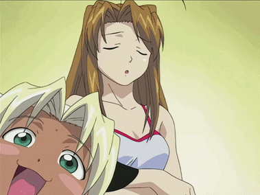 A Girl In A Cow Costume Is Hugging Another Girl GIF