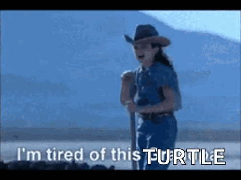 A Girl In A Cowboy Hat Is Tired Of This Turtle GIF