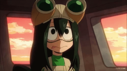 A Girl In A Frog Costume Is Looking Out A Window GIF