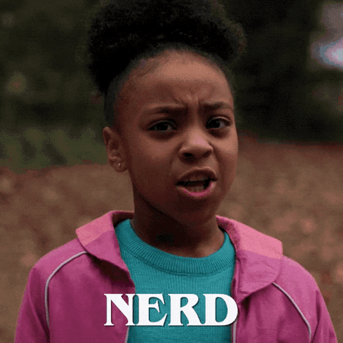 A Girl In A Pink Jacket With The Word Nerd Written On It GIF