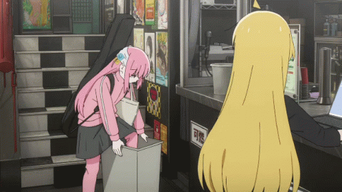 A Girl In A Pink Outfit Is Standing Next To A Girl In A Yellow Outfit GIF