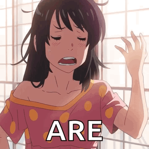 A Girl In A Pink Polka Dot Shirt With The Word Are On Her Chest GIF