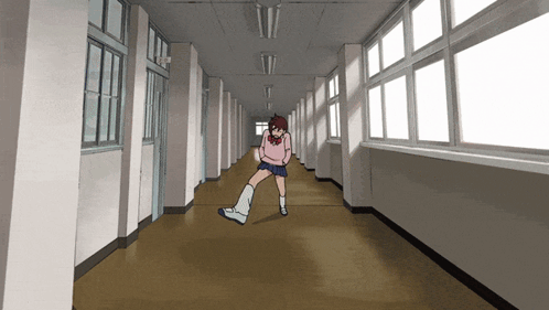 A Girl In A Pink Shirt And Shorts Is Dancing In A Hallway GIF