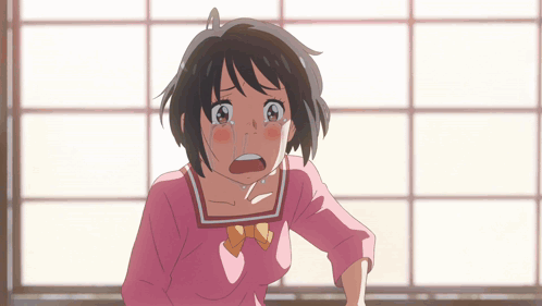 A Girl In A Pink Shirt Is Crying With Tears Running Down Her Cheeks GIF