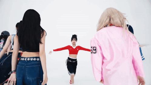 A Girl In A Pink Shirt With The Number 59 On The Back GIF