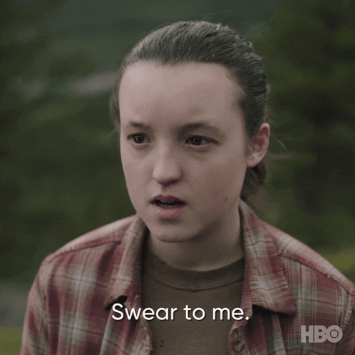 A Girl In A Plaid Shirt Is Making A Swear To Me Face GIF
