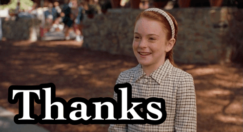 A Girl In A Plaid Shirt Is Smiling In Front Of The Word Thanks GIF
