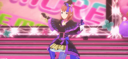 a girl in a purple dress is dancing on a stage in front of a sign that says couture