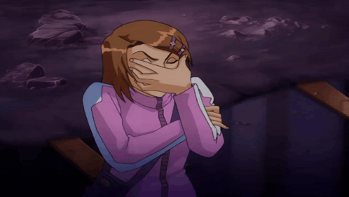 A Girl In A Purple Shirt Is Covering Her Face With A Towel GIF