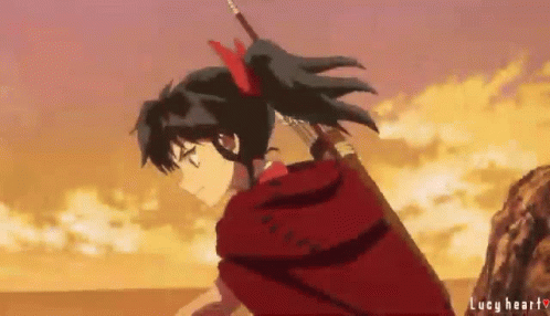 A Girl In A Red Cape Is Holding A Sword In Her Hand While Standing On Top Of A Rock . GIF