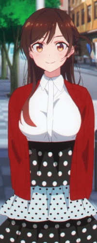 A Girl In A Red Cardigan And Polka Dot Skirt Is Smiling GIF