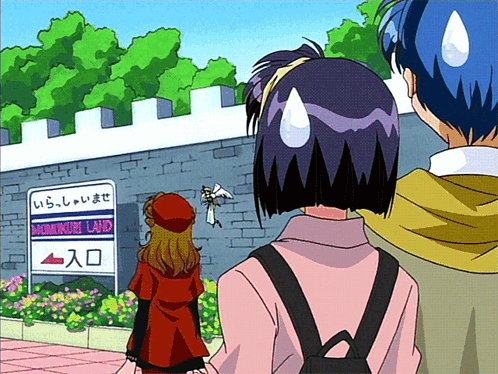 a girl in a red coat stands in front of a sign that says momingo land