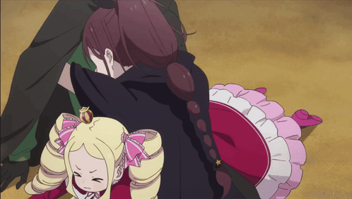 A Girl In A Red Dress Is Laying On The Ground Next To A Girl In A Black Cape GIF