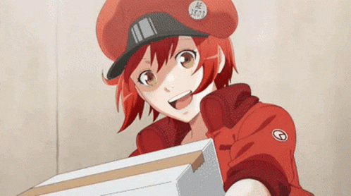 A Girl In A Red Hat Is Holding A Cardboard Box And Smiling GIF
