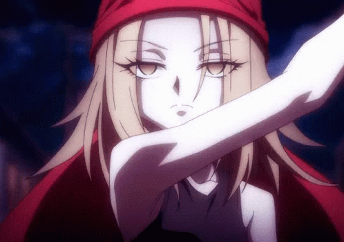 A Girl In A Red Hat Is Making A Stop Sign With Her Hand GIF