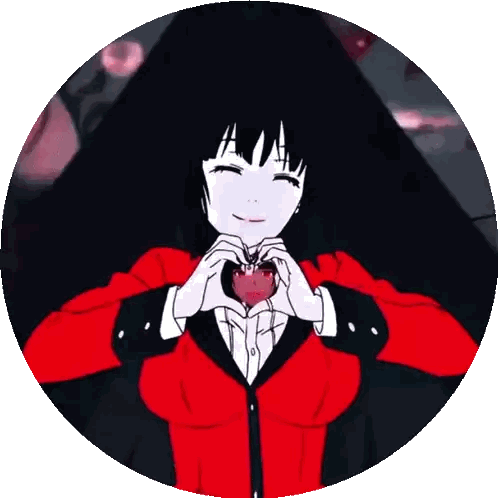 a girl in a red jacket makes a heart with her hands