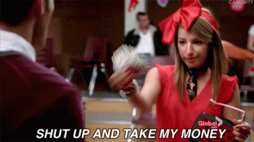 A Girl In A Red Shirt Is Holding A Bunch Of Money And Says Shut Up And Take My Money GIF