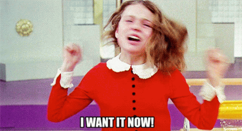 A Girl In A Red Sweater Says " I Want It Now " GIF