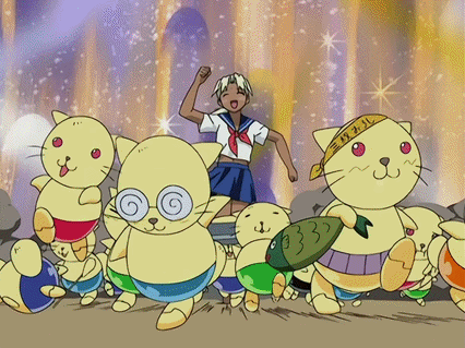 A Girl In A Sailor Uniform Is Surrounded By Cats With One Wearing A Bandana With The Number 33 On It GIF