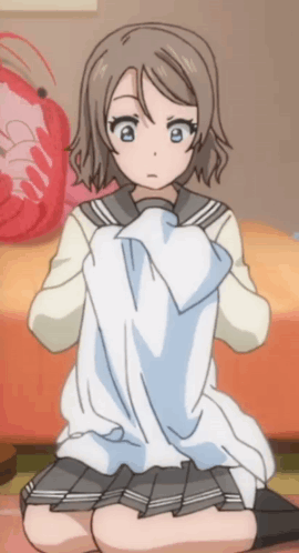 A Girl In A School Uniform Is Kneeling Down Holding A White Cloth GIF