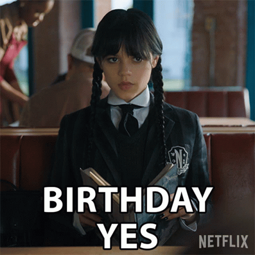 A Girl In A School Uniform Is Reading A Book And Says " Birthday Yes " In White Letters GIF