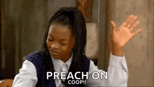 A Girl In A School Uniform Is Sitting At A Table With Her Hands In The Air And Says Preach On Coop . GIF