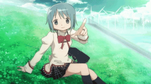 Girl In School Uniform Sitting In Grass Pointing GIF