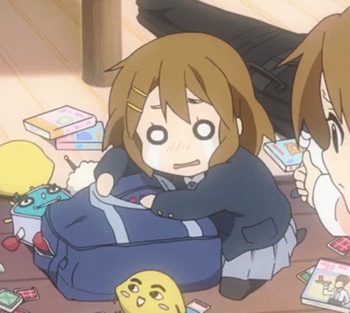 A Girl In A School Uniform Is Sitting On The Floor With A Backpack GIF