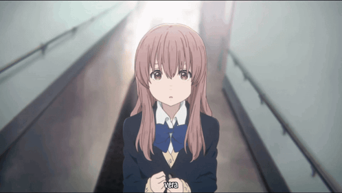 a girl in a school uniform is standing in a hallway and says vera