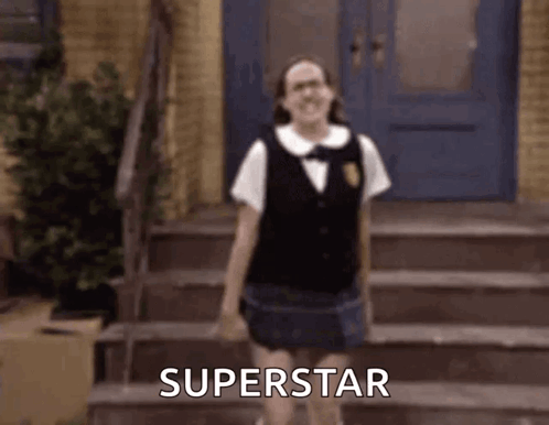 A Girl In A School Uniform Is Standing On A Set Of Stairs And Says Superstar . GIF