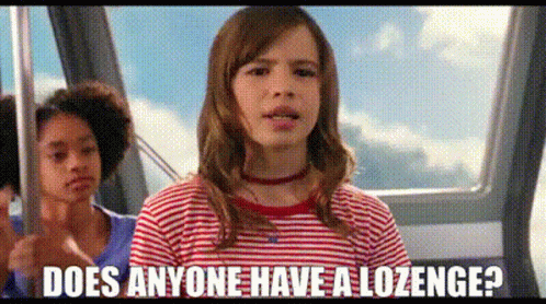 A Girl In A Striped Shirt Is Riding A Cable Car And Asking Does Anyone Have A Lozenge ? GIF