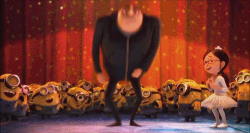 A Girl In A Tutu Stands Next To A Man In A Black Jacket GIF