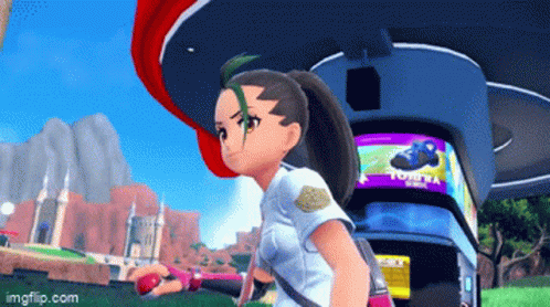 A Girl In A Video Game Is Standing In Front Of A Sign That Says Tomy GIF