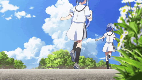 A Girl In A White Dress With The Letter T On It Is Running With Another Girl GIF