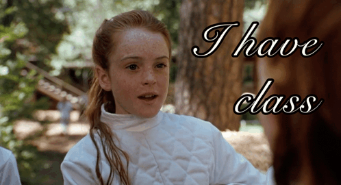 A Girl In A White Jacket With The Words " I Have Class " Above Her GIF