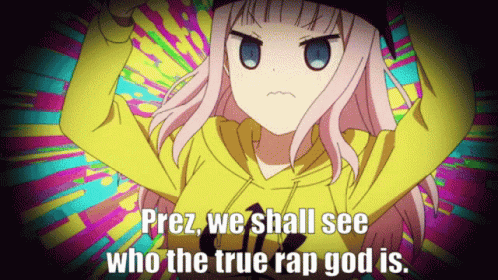 A Girl In A Yellow Hoodie With The Words " Prez We Shall See Who The True Rap God Is " Above Her GIF