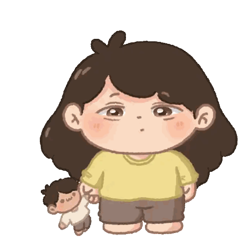 a girl in a yellow shirt is holding a doll