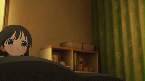 A Girl In A Yellow Shirt Is Standing In A Room GIF