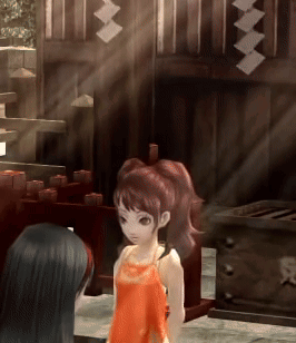 A Girl In An Orange Dress Is Standing Next To Another Girl In A Dark Room GIF