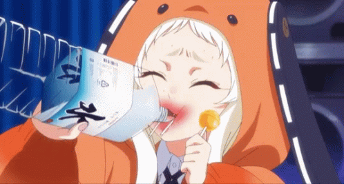 A Girl Is Drinking From A Plastic Bottle With Chinese Writing On It GIF